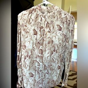 Elegant, but with edge blouse.